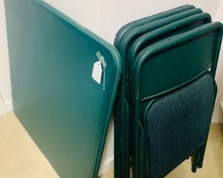 Nice card table with four matching chairs