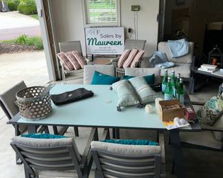Glass topped patio table and chairs