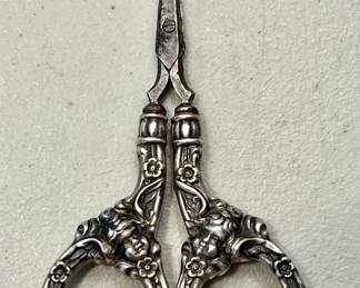 Sterling sewing scissors with cherub faces/wings & floral garlands