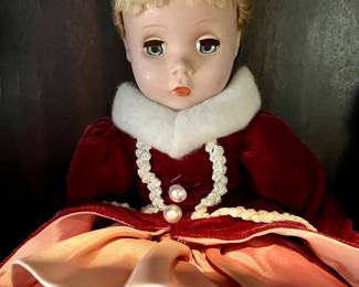 Vintage hard plastic doll with new wig and clothing