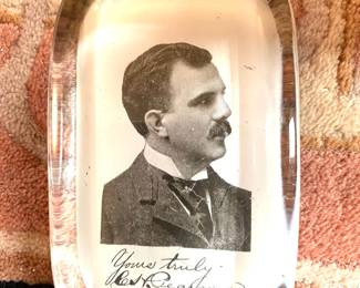 Antique advertising paperweight