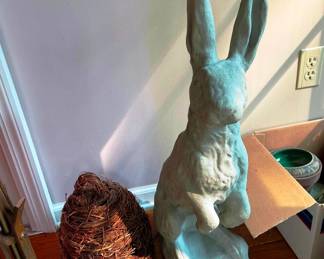 A tall cement bunny
