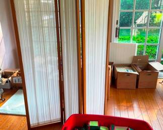 A room divider and Christmas ornaments