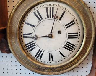 Wood dial, wood case, time only, runs.  Brewster and Ingraham of Bristol Connecticut. late 1800s. 17" across.  