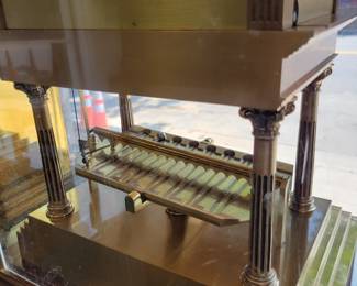 Congreve Rolling Ball Clock. Invented by Sir William Congreve in 1808. This reproduction was built in the 1960's by the worlds oldest Clockmaker, Thwaites & Reed of London. The tilting table and rolling ball act as the pendulum, with each oscillation taking 15 seconds. 