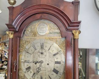 John Foster London, England. Tall case Clock. Circa 1820. Silver Dial. Serviced.  Mahogany Flame Case.