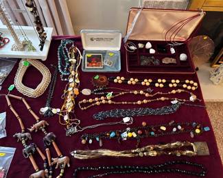 table full of mostly costume jewelry. No gold. 