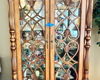 Ornate solid wood trimmed curio cabinet with glass doors , bottom drawer 50”w x 24d x 84”h $500
