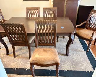 Bernhardt Furniture Dining table
45”w x 75” x 30”h with (2) leaves & pads $$850
4 carved wood, leather seat chairs $125ea
2 leather seat arm chairs $165 ea
Total set $1650