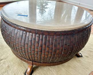 36” Rnd x 20”h footed, wood basket weave coffee table with marble like top $250
