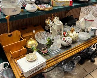 Corning cookware, cast iron skillets, beautiful glass coffee table, glassware, electric vintage tea kettle, home decor, etc.