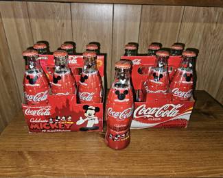 Collection of Mickey Mouse Coca Cola Bottles