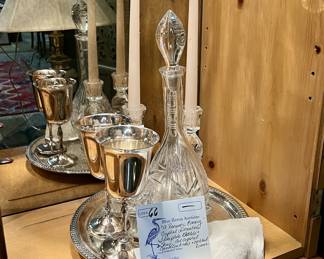 Lot of Crystal Decanter, Pair of Crystal Candlestick Holders, Pair of Silver Plate Goblets, Cocktail Linen Napkins on a Silverplate Tray