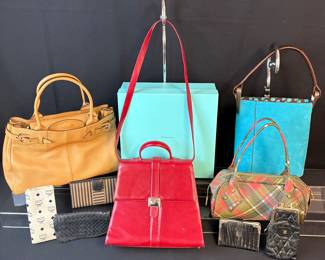 Tod, Tiffany & Co, back right Kenzo Paris, Plaid Vivian Westwood, Bottega Veneta, Chanel, Fendi, MCM