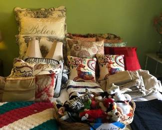 Lots of bedding pillows home decor 