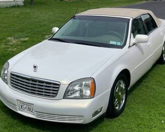 2004 Cadillac DeVille; 50,000 +/- original miles, customized; one of only 7 made, like new.