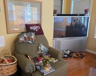 Chair in sunroom, stool, basket & vintage large screen TV -Sunroom
