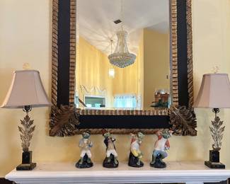 Absolutely gorgeous mirror over the fireplace
Large and heavy and the cutest band of playing frogs majolica