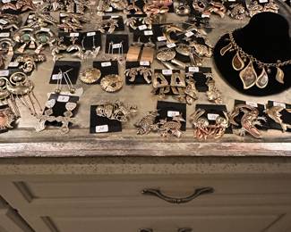 Brand new from Saint Croix designed with copper brass and stainless steel earrings pierced and a few clip on, sets with a pin and matching earrings. Think Mothers Day