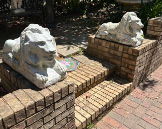 Concrete lions
Old and extremely heavy
U will have to have professional movers move these