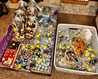 Good collection of marbles, plus buttons and jewelry