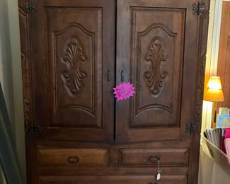 carved mesquite wood armoire