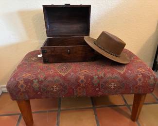 leather hat, wood box, upholstered bench
