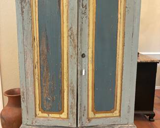 Rustic painted armoire