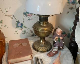Marble top side table, oil lamp