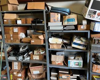 Lots of phone equipment; tools; boxes