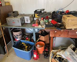 Lots of phone equipment; tools; boxes