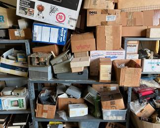 Lots of phone equipment; tools; boxes