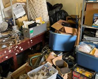 Lots of phone equipment; tools; boxes