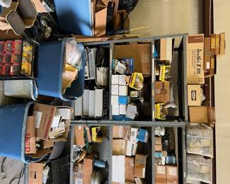 Lots of phone equipment; tools; boxes