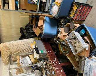 Lots of phone equipment; tools; boxes