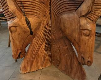 Hand-carved wooden horse table base with glass top
