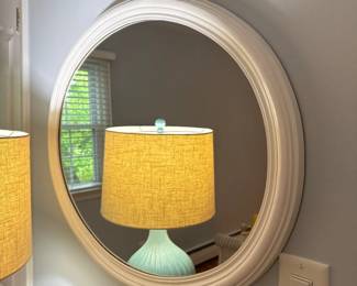 white round wall mirror
