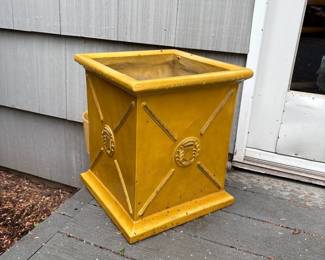 yellow square shaped planter