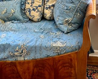 A 19th C flame mahogany day bed from France