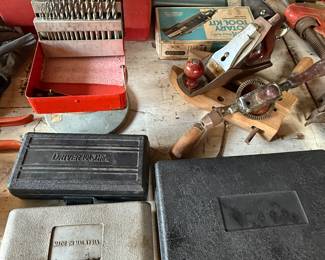 Tool sets, and drill bits