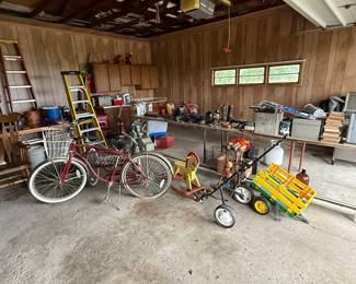 Great pictures from the day we got the keys! A rear three wheeler adult bike and matching two wheeler!