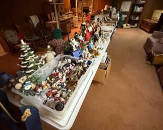 Three entire banquet tables filled with Christmas items from vintage to new