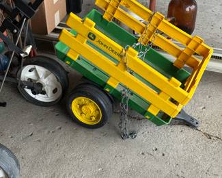 Great pictures from the day we got the keys! Love this little John Deer Childs Trailer!