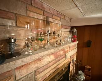 Lots of oil lamps, all shapes and sizes