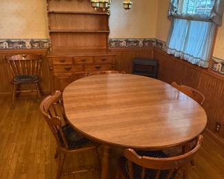 Great pictures from the day we got the keys! Beautiful dining table and chairs with matching hutch! In pristine condition!
