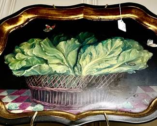 TOLE TRAYS ALL OVER THE WALL IN THE KITCHEN.