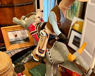 DELBERT BUCK INDIAN COWBOW ON BRONCO.