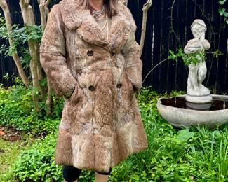 NAOMI MODELINGA VINTAGE RABBIT FUR COAT.