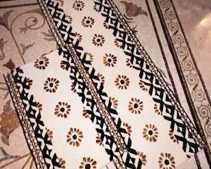 "Crazy Daisy" rug by MacKenzie Childs, 2'6" x 8' and 27"x 44".
