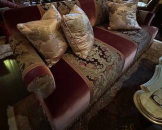 Vintage Paisley velvet upholstered sofa with tassles.